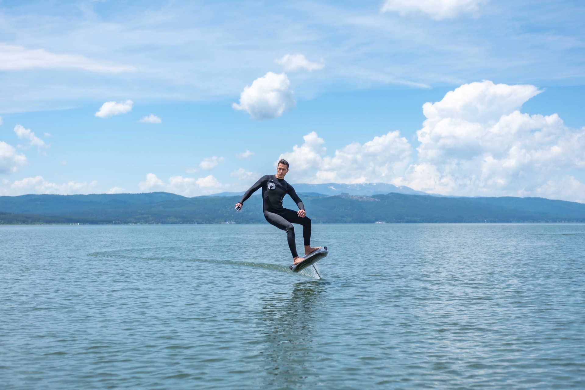 SiFly eFoil gliding on a mountain lake